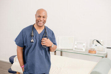 Smiling healthcare professional in blue scrubs