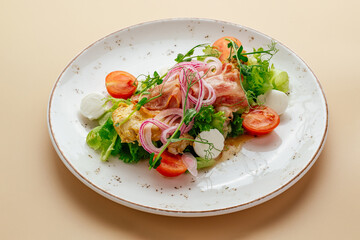 salad with chicken fillet, bacon and vegetables