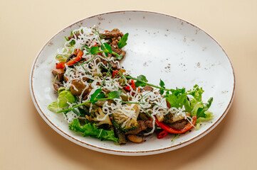 salad with beef, broccoli and herbs