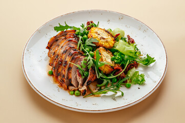 grilled meat with arugula and corn