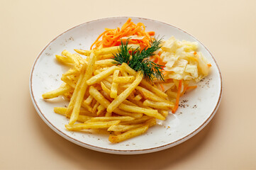 French fries with vegetables on a plate