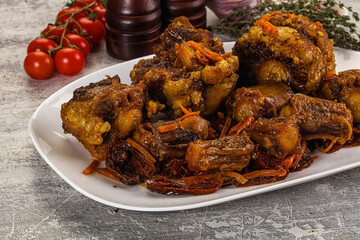 Baked oztail with tomato and carrot