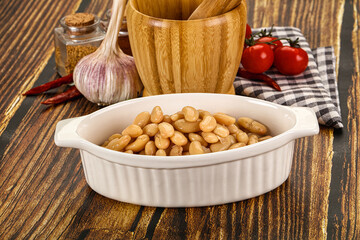 Baked white canned beans in the bowl