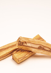 Palo Santo Wooden Sticks Closeup View. Vertical Photography with Copy Space.