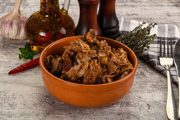 Shredded slow cooked pork meat