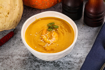 Pumpkin cream soup with prawns