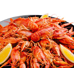 Delicious red crawfish served with lemon wedges on a platter