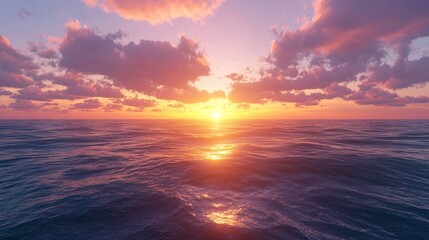 Fototapeta premium A vibrant sunset over a calm ocean with gentle waves.