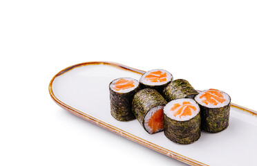 Sushi rolls with salmon on a white plate displayed for enjoyment