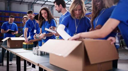 Food Bank Volunteer Community Packing Donation. Non Profit Aid - Powered by Adobe