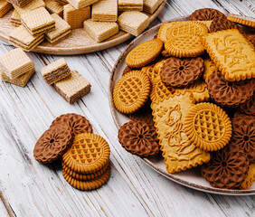 Crunchy cookies on a wooden surface in a cozy setting