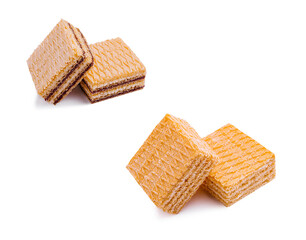Crispy wafer cookies stacked on a white background