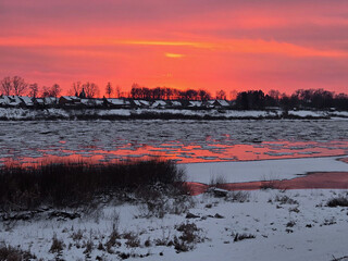 Naklejka premium Ice drift on the river. Winter landscape