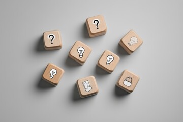 Wooden Blocks with Ideas on Grey Background