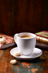 Cup of coffee on wooden background. Soft focus. Copy space