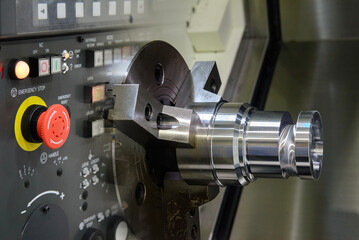 Abstract scene the CNC lathe machine working and control panel background.