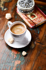 Cup of coffee on wooden background. Soft focus. Copy space