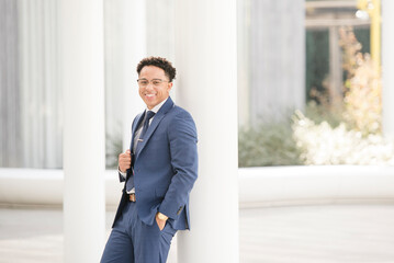 Confident young professional in a stylish blue suit