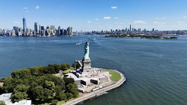 The Statue of Liberty with the New York and New Jersey downtown cityscape in the background. USA