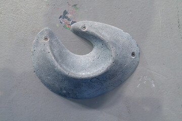  Big climbing hold on a wall close-up