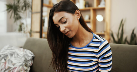 Thinking, smile and woman in home, memory and planning for college in apartment, living room and peace. Lounge, contemplating and Indian person with nostalgia, daydream or university student in house