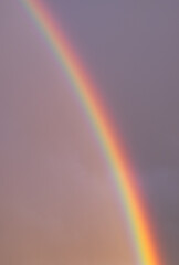 Rainbow in moody sky