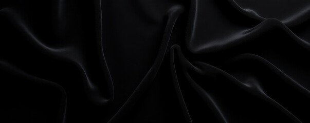 Obraz premium Black velvet backdrop, subtle sheen Smooth, rich, dark textile , smooth, velvet cloth