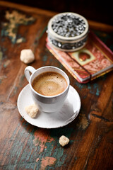 Cup of coffee on wooden background. Soft focus. Copy space