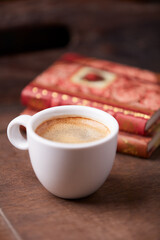 Cup of coffee on wooden background. Soft focus. Copy space