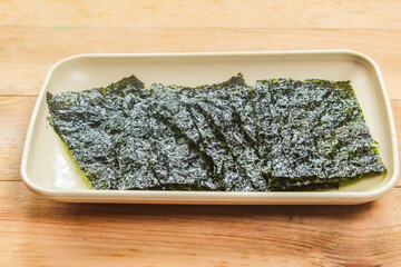 a few pieces of nori seaweed in a plate