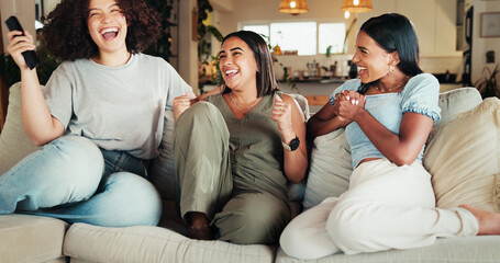 Woman, friends and laugh with tv, comedy special and living room for smile and movies. People,...