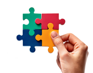 Assembling colorful puzzle pieces by hand isolated on transparent background