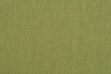 A close-up, full-frame shot of finely textured olive green fabric, showing a consistent weave pattern