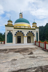 Fototapeta premium View of the mosque on the mountain slopes in the morning
