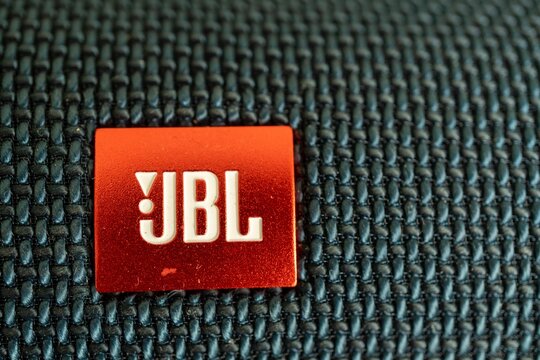 Close-up shot of the black JBL brand music speakers logo