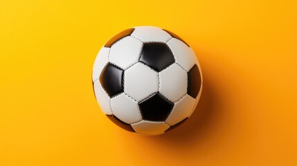 Naklejka premium Dynamic soccer ball scene, isolated top view, soft even lighting, bright and clean orange background.