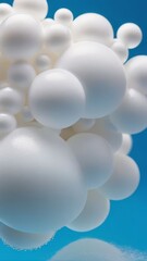 Close-up of white foam bubbles cluster with water droplets on blue background, hygiene and cleaning concept macro shot