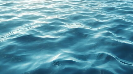 Fototapeta premium Calm blue ocean water surface with gentle ripples and reflections of sunlight