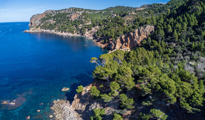 Obraz premium Alconasser coast - Bens de Avall -, Muleta mountain and Punta Rotja cape, Deia, Natural area of the Serra de Tramuntana., Majorca, Balearic Islands, Spain