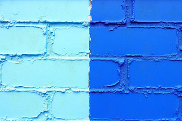 Close up of wall with two sections light blue and darker blue