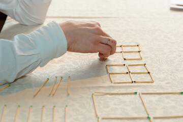 Challenges and puzzles with matches. An IQ test game . A test of mental ability.