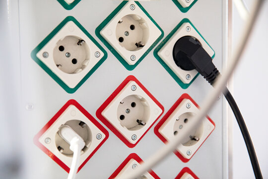 Plugs attached to electric outlets