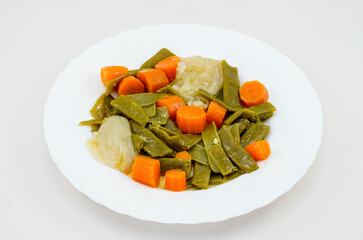 Healthy vegetables, beans with onions and carrots, traditional dish, Mediterranean diet.