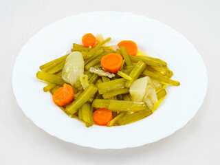 Healthy vegetables, borage with onion and carrot, traditional dish, Mediterranean diet.