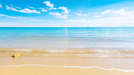 Fototapeta premium A serene beach with clear turquoise water, gentle waves lapping at the shore under a bright sunny sky. The scene is peaceful and perfect for relaxation or a tropical vacation.