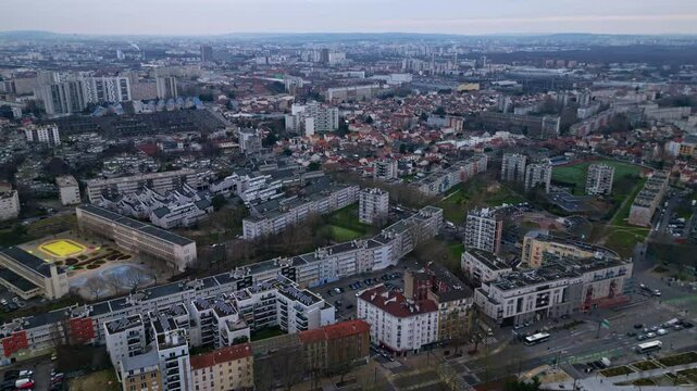 Panorama drone view of Aubervilliers skyline with cityscape and cloudy sky, Paris region, Seine Saint-Denis in France.