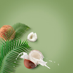 coconuts with milk splash and leaf on a light green background