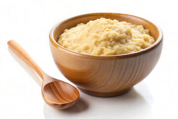 Wooden bowl of creamy oatmeal with wooden spoon