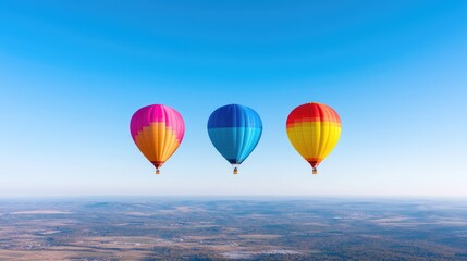 Fototapeta premium Colorful hot air balloons over landscape