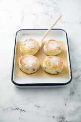 Homemade curd cakes with icing sugar